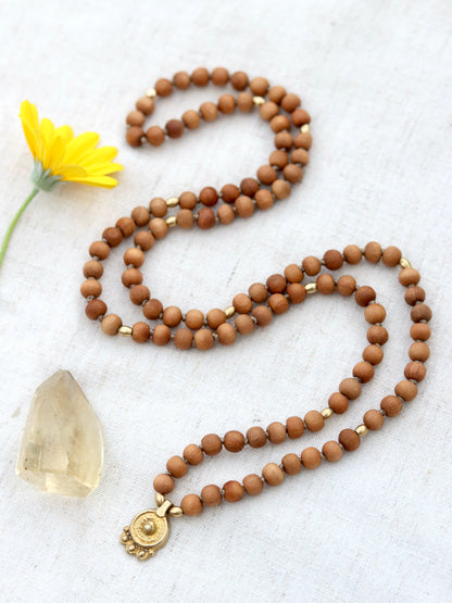 Sandalwood Mala Necklace with Brass Sun Charm Pendent