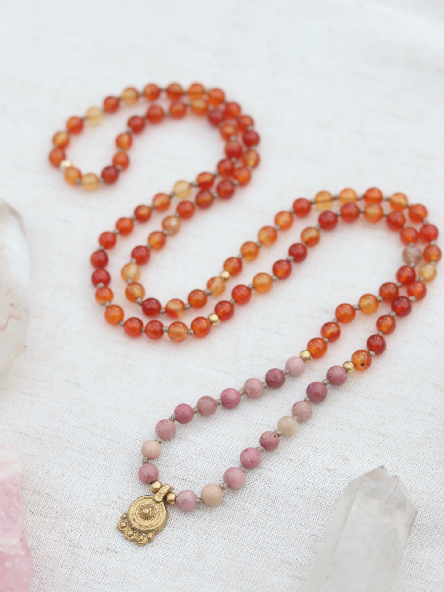 Pink Rhodonite and Carnelian Mala Necklace with Brass Sun Charm Pendent