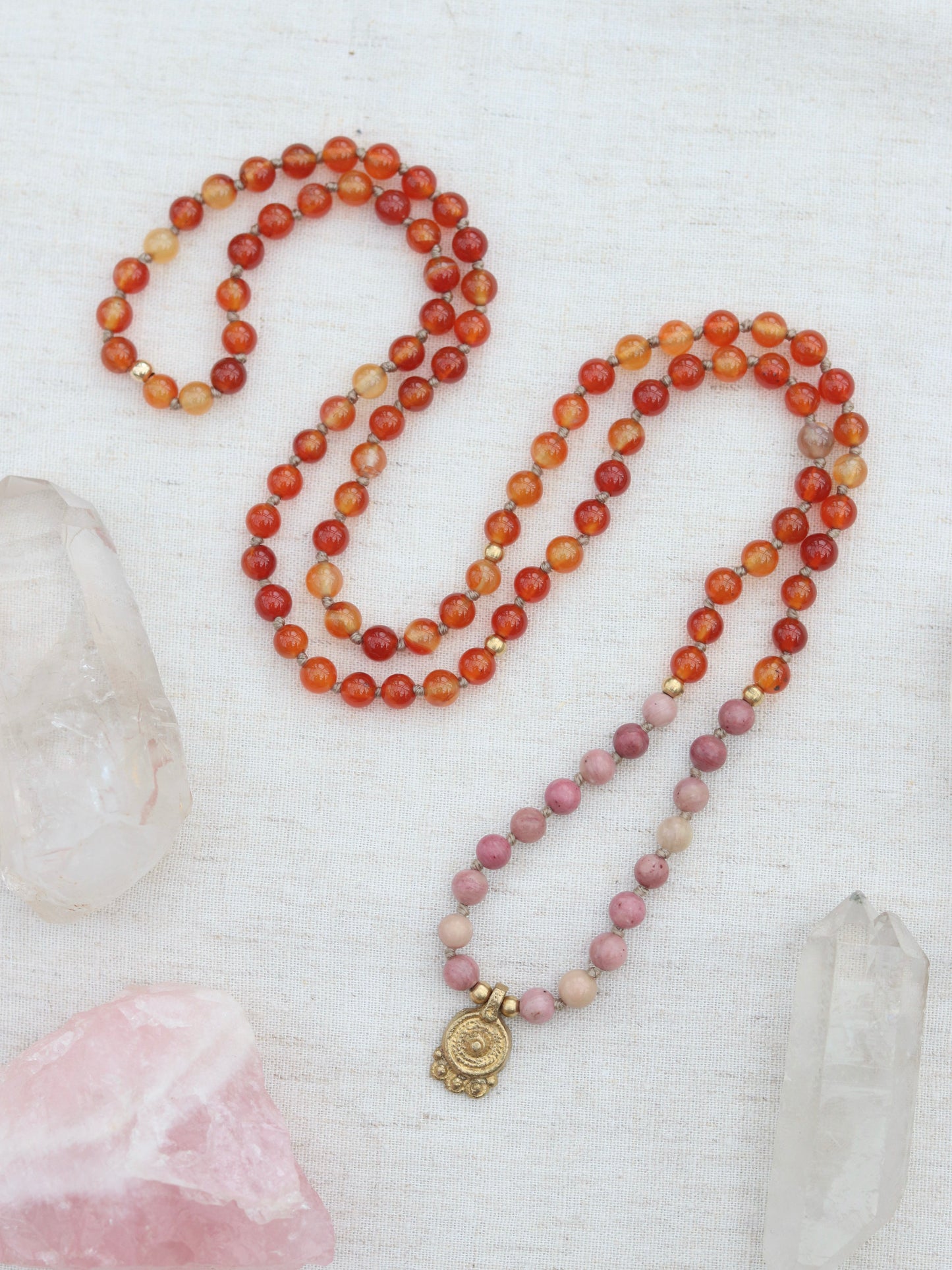 Pink Rhodonite and Carnelian Mala Necklace with Brass Sun Charm Pendent