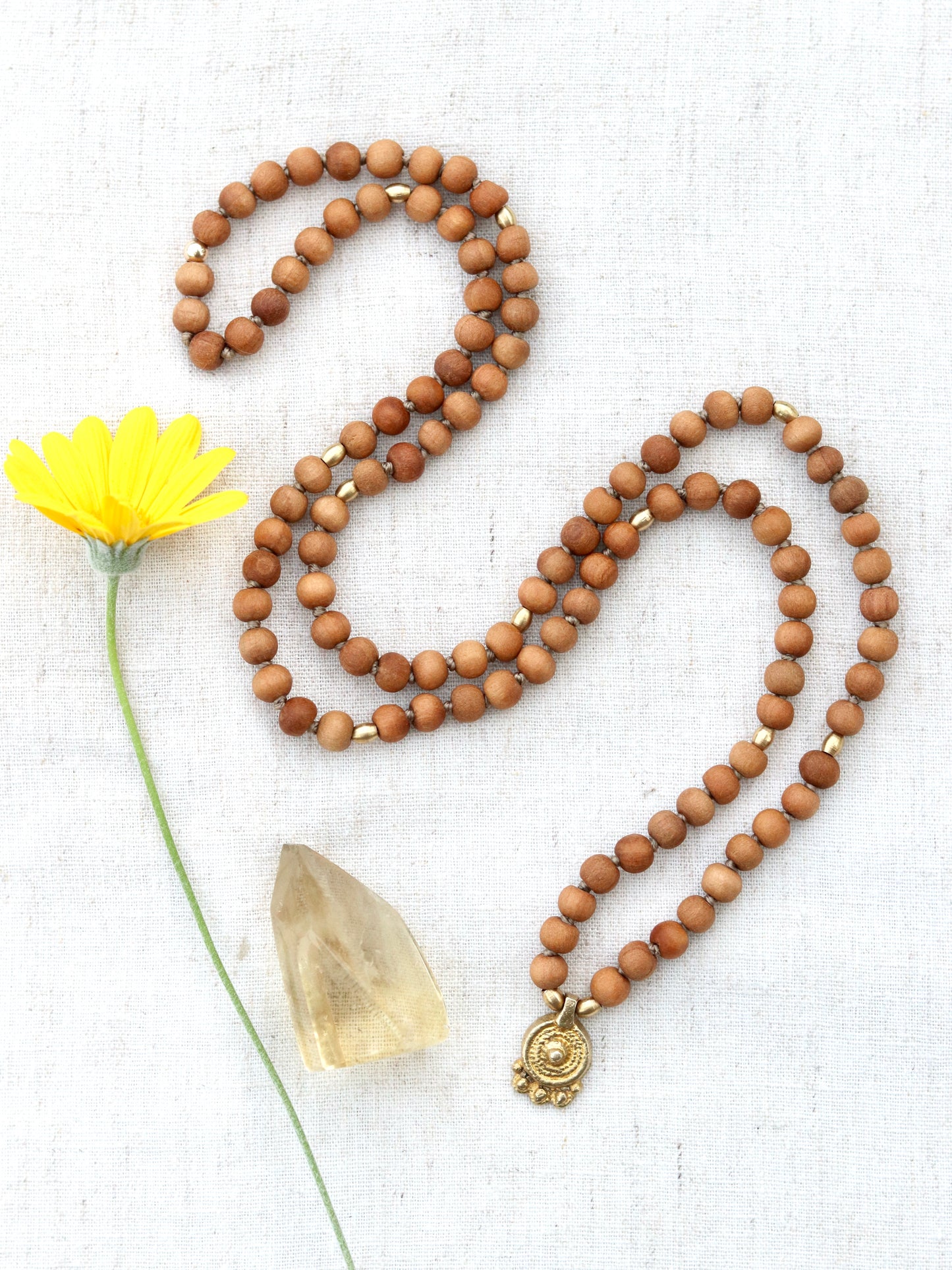 Sandalwood Mala Necklace with Brass Sun Charm Pendent