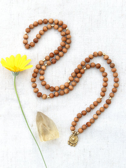 Sandalwood Mala Necklace with Brass Sun Charm Pendent